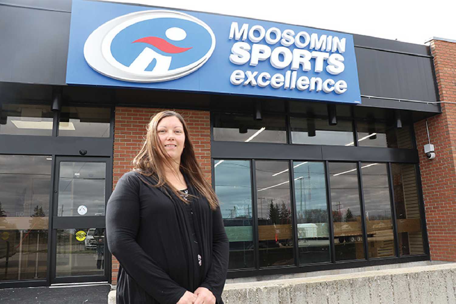 Angela Hales, the manager of Moosomin Sports Excellence, in front of the new store.